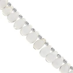 85cts Clear Quartz Smooth Drops Approx 7x5 To 11x7mm, 20cm Strand With Spacers