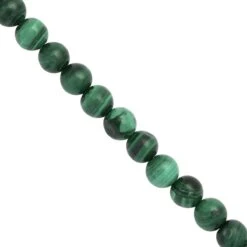 40cts Malachite Smooth Round Approx 4 To 5mm, 18cm Strand With Spacers