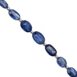 30cts Nilamani Faceted Oval Approx 6x4 To 11x8mm, 18cm Strand With Spacers
